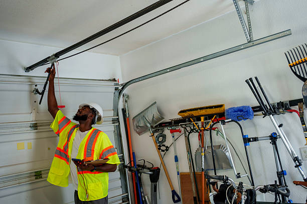 Professional Garage Door Roller Replacement technician working in East Moriches, NY